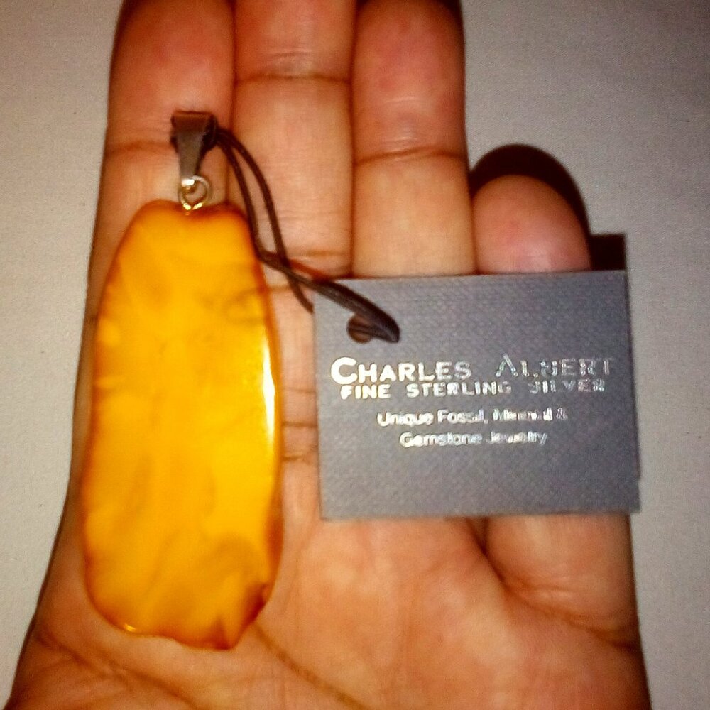 Charles Albert:  Baltic Butterscotch Amber Slice Pendant:  Sterling Silver